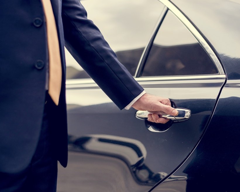 Chauffeur opening door